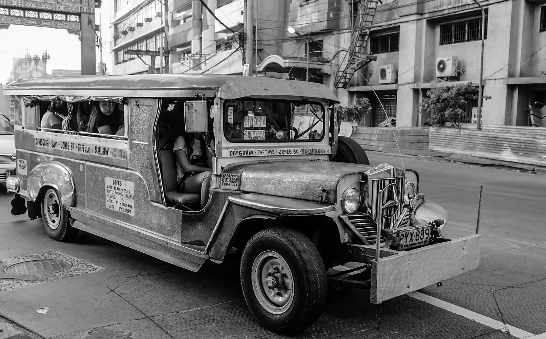 Jeepney with passengers